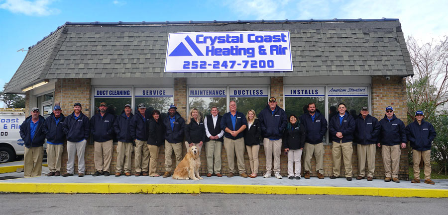 crystal coast heating and cooling team outside of office